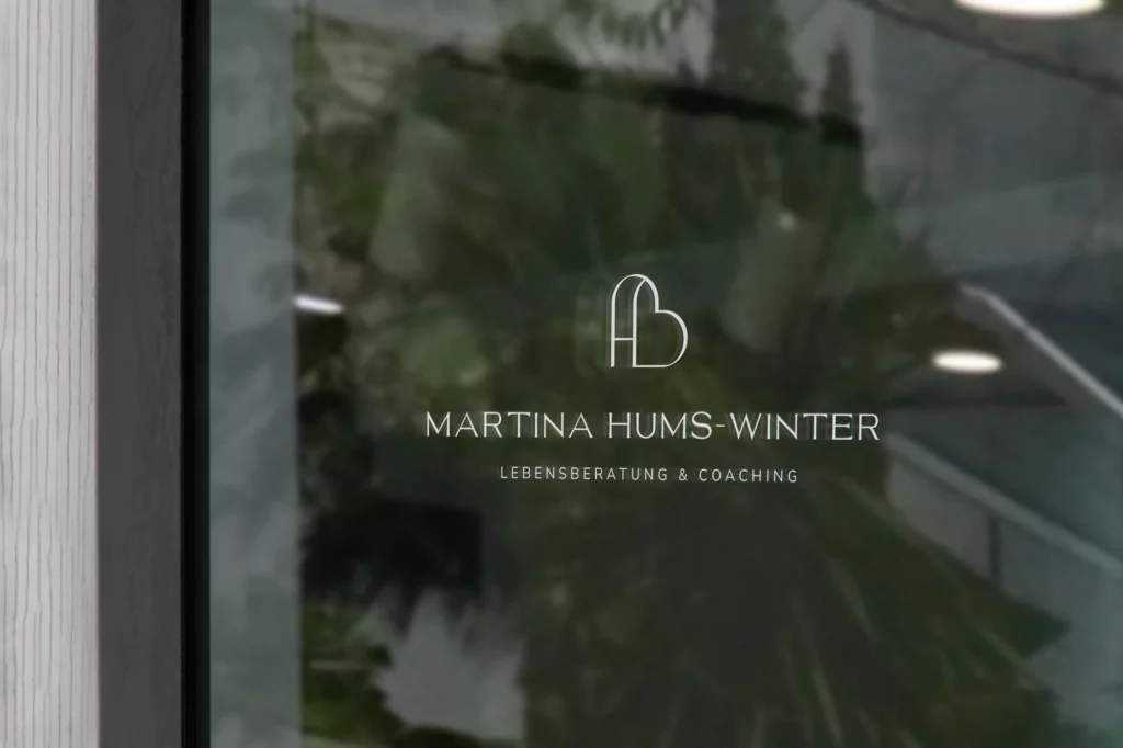 Martina Hums-Winter 5 logo v3 white on door SATO studio